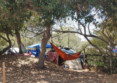 Tents have sprung up all over the People’s Park in Isla Vista. It is much different now, but we are meeting in a clear section of the park.